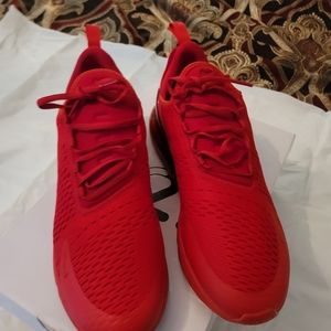 Red like new Nike Sneakers.